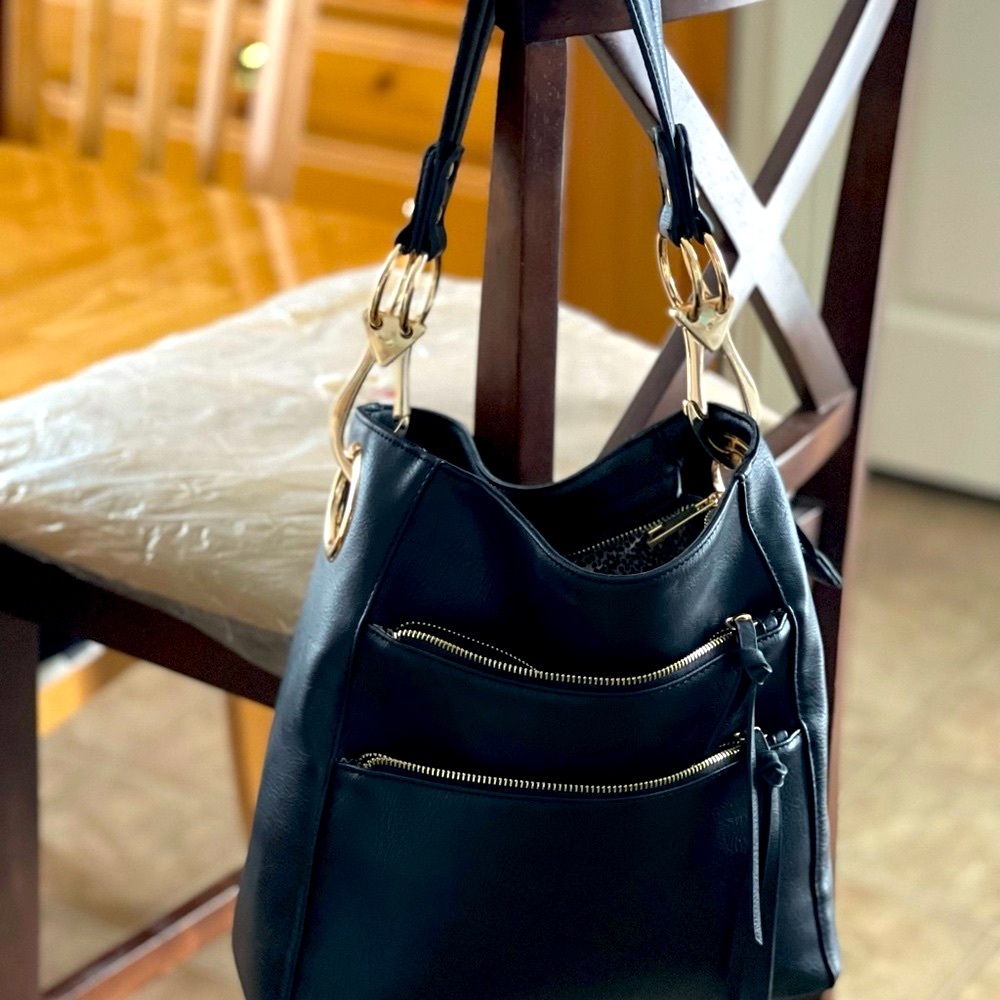 Gorgeous Woman’s black shoulder bag